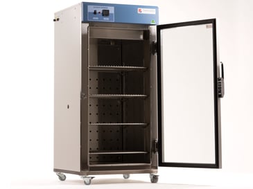 blanket warmer with glass door open and multiple shelves