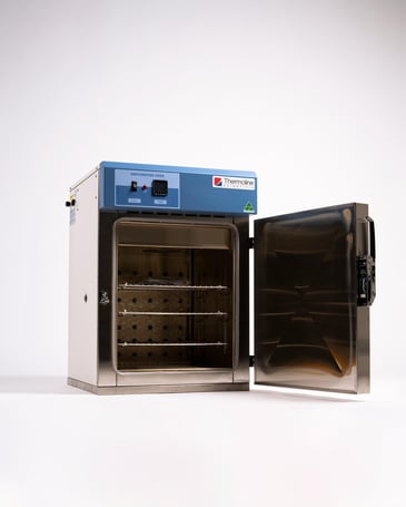 laboratory oven with stainless steel door open and shelves