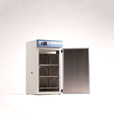 laboratory incubator with door open showing open wire shelves